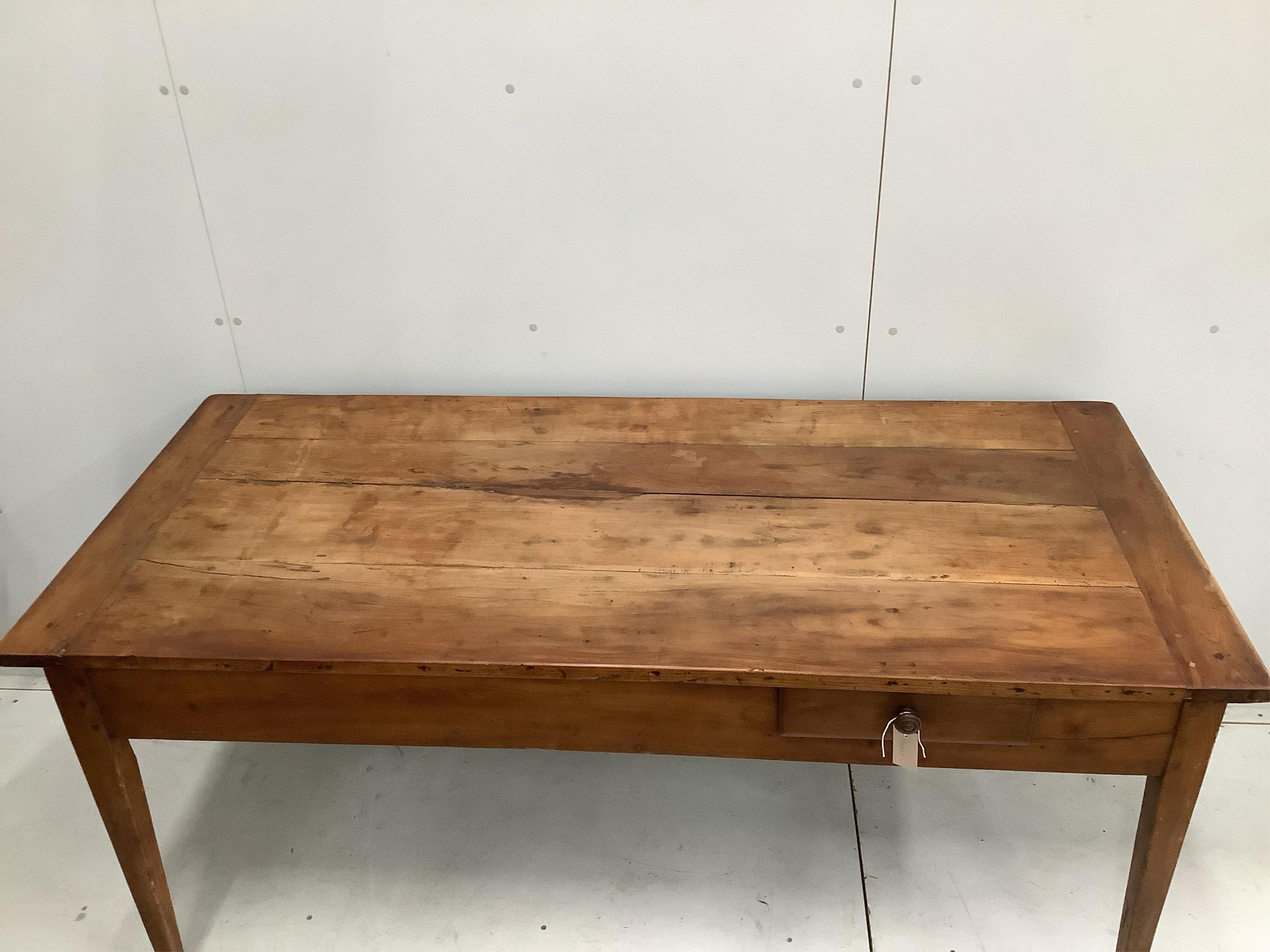 A late 19th century French cherrywood kitchen table with two drawers, width 170cm, depth 78cm, height 78cm. Condition - fair